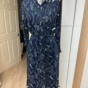 Rayon dress. Self belt, side pockets, long sleeve w/ cuffs